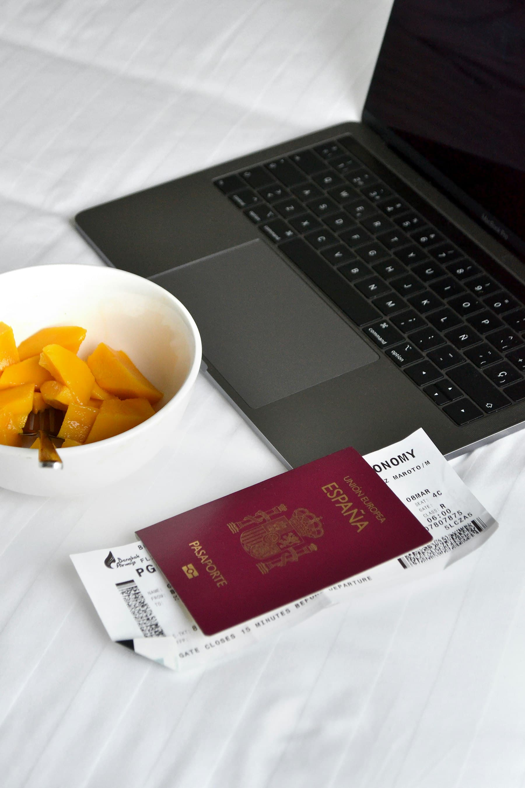 Travel planning materials arranged in a refined hospitality setting.